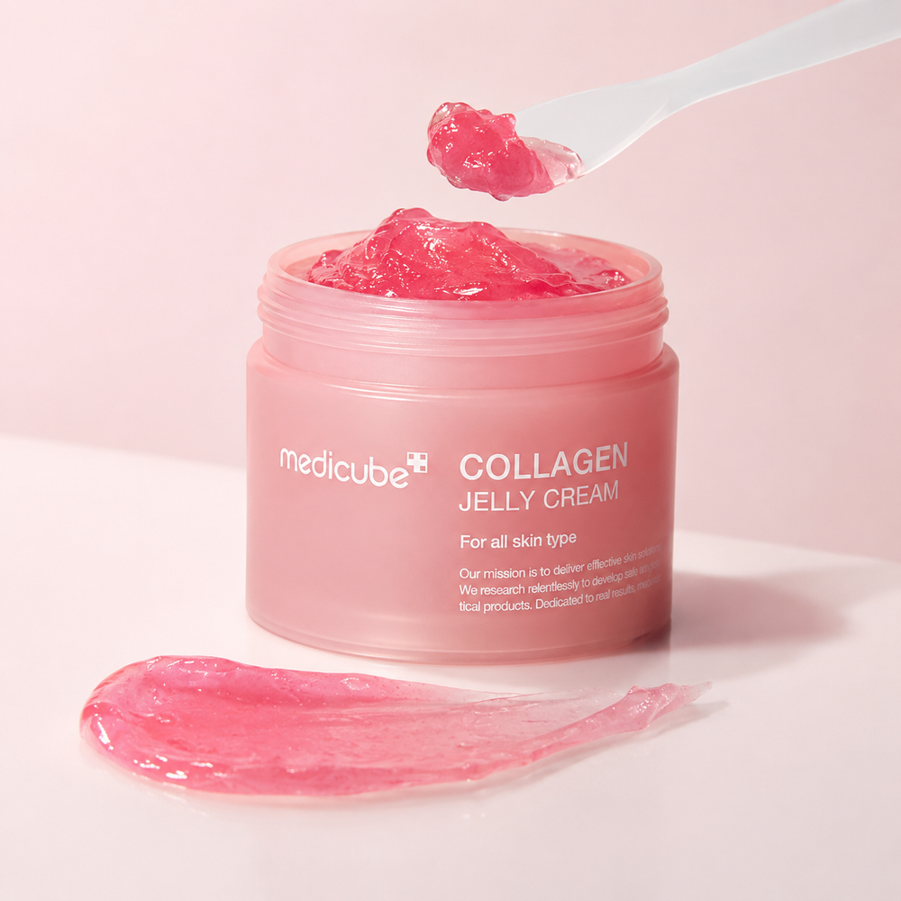 Collagen Jelly Cream with spatula and pink jelly texture swatch on a soft skincare surface.
