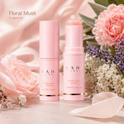 KAHI Wrinkle Bounce Multi Balm displayed with soft flowers to represent its floral musk fragrance.